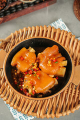 Braised Pork Knuckle in Golden Red Sauce with Chili - Traditional Asian Cuisine Dish