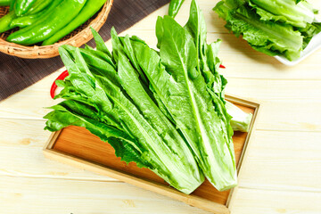 Fresh Green Vegetables Romaine Lettuce Pea Pods on Wooden Cutting Board Kitchen Preparation