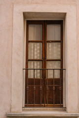 old wooden window with linen curtains, Old European aesthetic