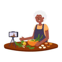 Grandma blogger shoots a culinary blog. Blog of an elderly blogger. Cooking, salad, grandmother, blogger, blog, food, vegetables, pepper, onion, spices