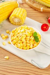Fresh Sweet Corn Kernels in Bowl with Whole Corn Cobs on Wooden Board - Golden Yellow Vegetable Ingredients