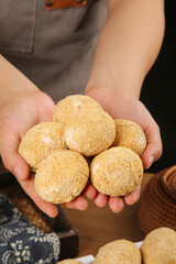 Fresh Golden Free-Range Eggs with Variable Loose Skin Coating Held in Hands for Organic Farm Cooking