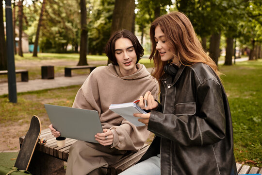 Young couple sharing ideas in a peaceful outdoor setting surrounded by nature