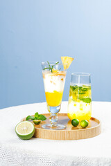 Fresh Tropical Pineapple Cocktails with Mint Garnish on Wooden Serving Tray