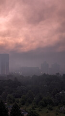 Kyiv City at Sunrise in Smoke After Drone Attack and Fires