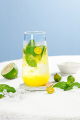 Refreshing Pineapple Mint Cocktail with Lime on Marble Counter