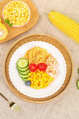 Gourmet Mixed Salad Bowl with Corn Kernels and Prawns on Wooden Tray