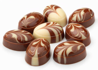 Fototapeta premium A beautiful and elegant close-up of gourmet chocolates with a swirled milk and white chocolate pattern