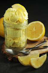 Lemon ice cream scoops in glass 