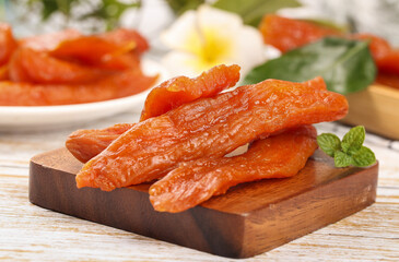 Sweet Dried Potato Strips with Honey on Wooden Board - Healthy Natural Snack Food