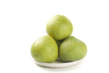 Fresh Green Pomelo Fruits on White Plate - Sweet Citrus for Healthy Diet