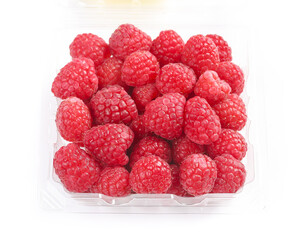 Fresh Red Raspberries in Plastic Container on White Background