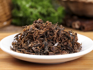 Dried Prunes on White Plate - Healthy Natural Fruit Snack Food Ingredient