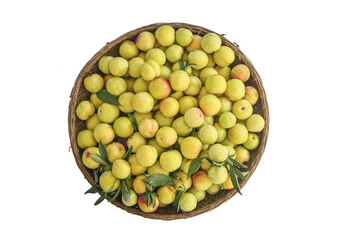 Fresh Yellow Plums in Wicker Basket on White Background