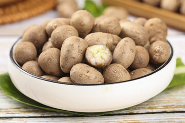 Fresh Organic Yam Beans in Bowl on Rustic Wooden Table - Healthy Root Vegetable Food Photography