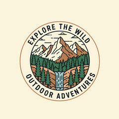 Circular emblem featuring mountains, a waterfall, and trees, with the text 