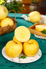 Fresh Golden Yellow Apples on Marble Plate Rustic Kitchen Table Setting