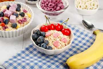 Healthy Oatmeal Breakfast Bowls with Fresh Berries and Fruits for Weight Loss Diet