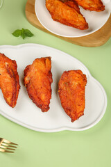 Crispy Spiced Fried Chicken Wings with Herbs Close-up Food Photography