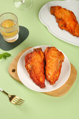 Crispy Fried Chicken Wings and Drumsticks with Golden Spiced Coating Closeup Food Photography