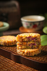 Healthy Homemade Energy Bars with Nuts Grains and Purple Filling on Cooling Rack