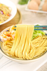 Fresh Ramen Noodles with Chopsticks - Traditional Asian Cuisine Preparation