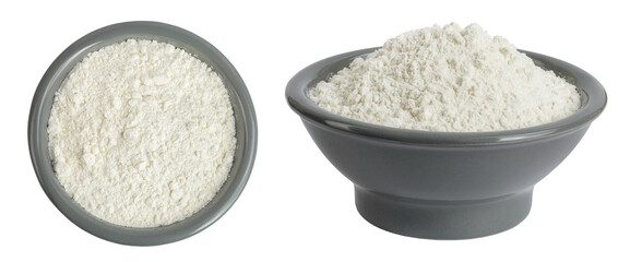 White flour in ceramic bowl isolated on white background. Top view. Flat lay.