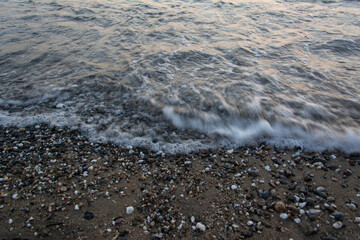 Gentle Sea Wave Flowing over Pebble Shore, Calabria