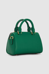Elegant green leather handbag stylish fashion accessory minimalist background isolated