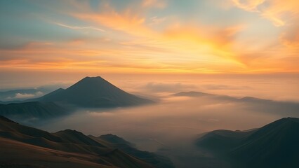 A breathtaking sunrise over Mount Bromo, with its iconic peak and a sea of clouds below. The golden-orange sky creates a surreal, majestic atmosphere over the vast volcanic landscape.