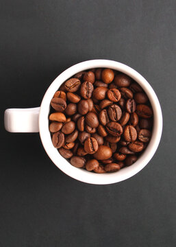roasted coffee beans close up. aromatic coffee beans. Vertical photo format