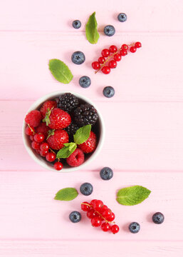 set of forest berries on the table top view.. Vertical photo format