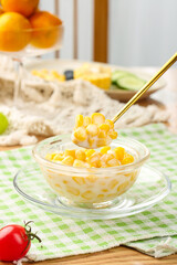 Golden Corn Kernels in Glass Bowl Ready for Salad Making - Fresh Vegetable Ingredient