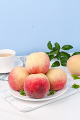 Fresh Golden Red Peaches on White Plate with Mint Leaves - Healthy Fruit Photography