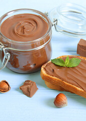 Toast with chocolate paste on the table.. Vertical photo format