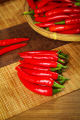 Fresh Red Hot Chili Peppers on Bamboo Mat - Sichuan Cooking Ingredients