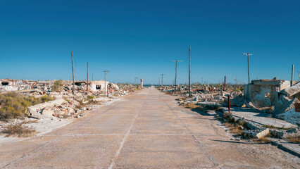 Main street of Villa Epecuén ghost town with ruins and destruction, Buenos Aires, Argentina.