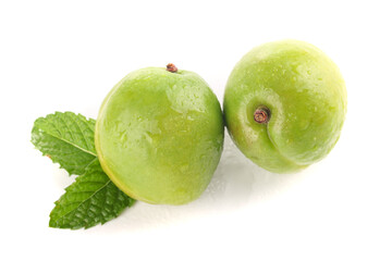 Fresh Green Plums with Mint Leaves on White Background