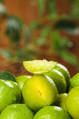 Fresh Green Sichuan Plums with Crisp Flesh and Pit Exposed