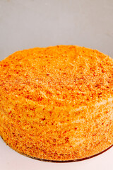 Colorful cake with crumb topping ready for serving at a festive gathering