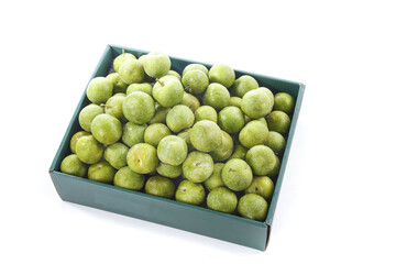 Fresh Green Sichuan Plums in Box - Crisp Aromatic Fruit with Natural Aroma on White Background