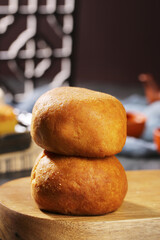 Traditional Chinese Moon Cakes for Mid-Autumn Festival Celebration on Wooden Board