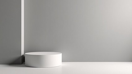 White Cylindrical Podium Against Gray Wall