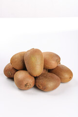 Fresh Organic Kiwifruit from Shaanxi Meixian China - Healthy Tropical Fruit Pile on White Background