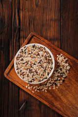 Mixed Brown Rice Varieties Five Color Grain Bowl on Wooden Background Healthy Low Fat Food