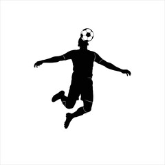 Silhouette of a soccer player heading the ball