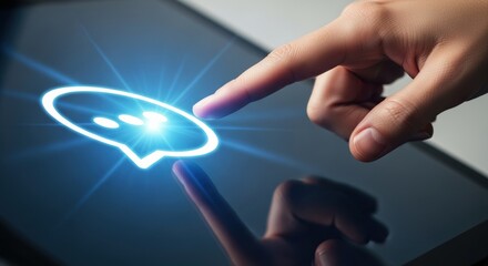 Finger touching a tablet screen with a glowing chat bubble icon.