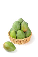 Fresh Green Mangoes from Sichuan Panzhihua in Wicker Basket on White Background