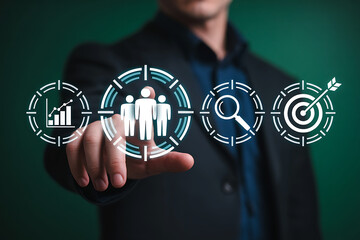 Businessman touches digital interface showing business growth search and target achievement icons