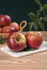 Fresh Red Apples on Marble Board with Natural Kitchen Setting